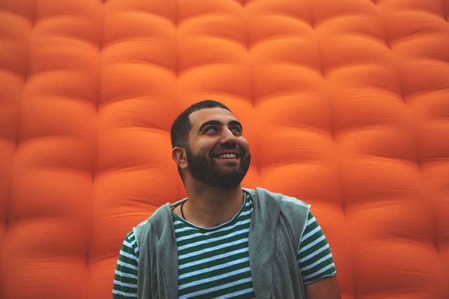 man in front of inflatable